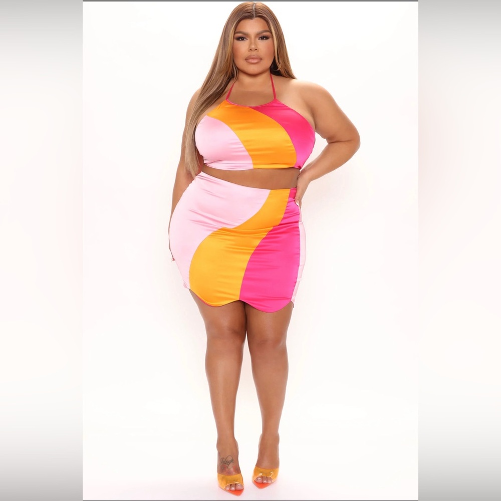 Never worn! 1x fits like an XL, made for perky breast or breast you can tape up.